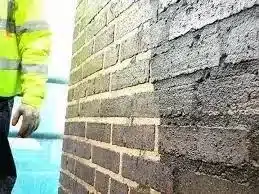 Professional contractor performing high quality brick repointing in London